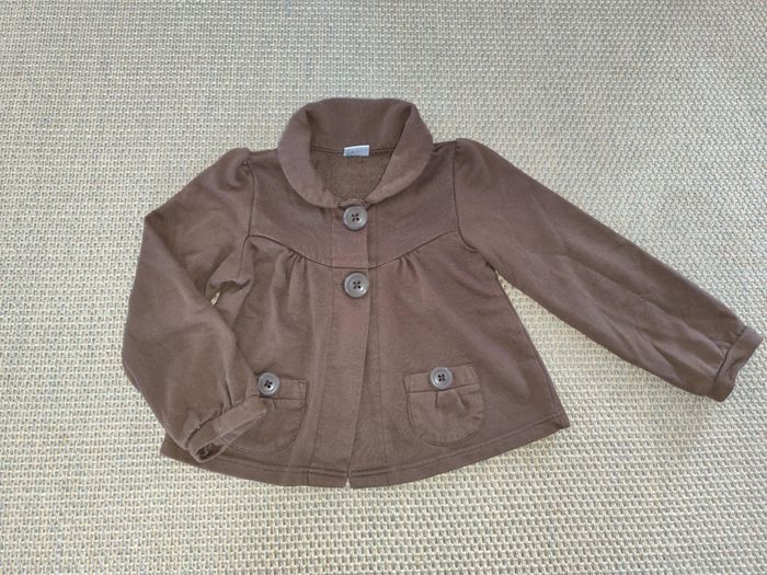 Gilet fille , 8 ans , très bon état