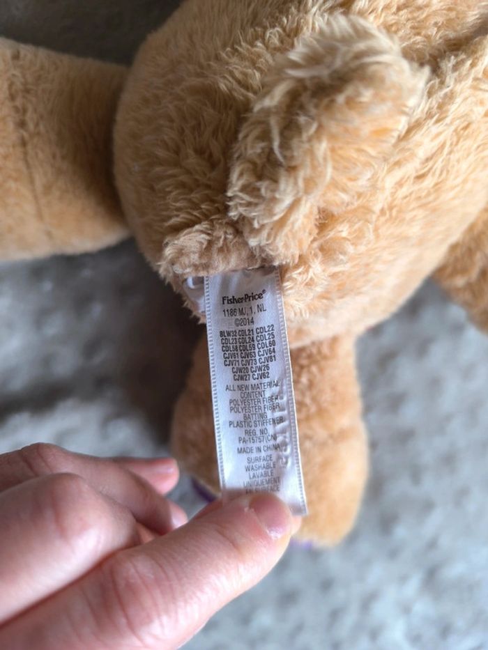 Peluche musicale d'Éveil Puppy en très bon état - photo numéro 4