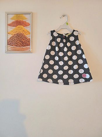 Joli haut noir à pois TQF 12 mois