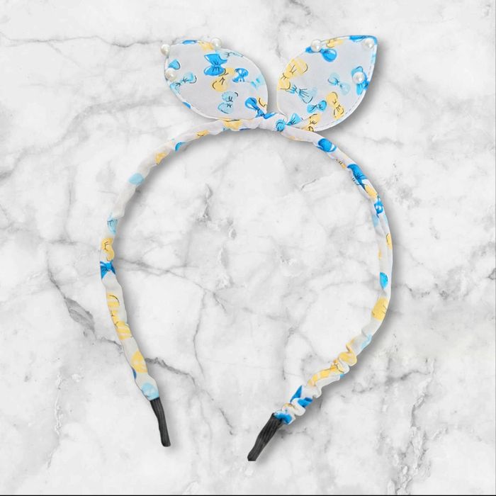 Bandeau avec oreille et perle