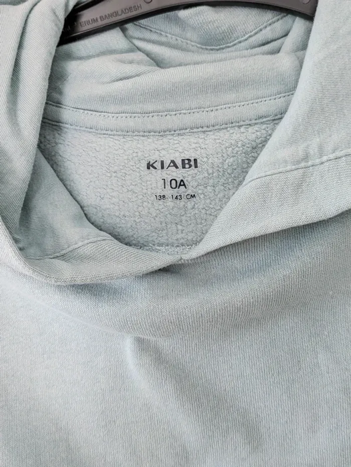 Sweat-shirt à capuche sans manche vert d'eau Très bon état - Kiabi - 10 ans - photo numéro 2