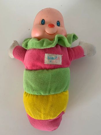 Peluche bébé multicolore