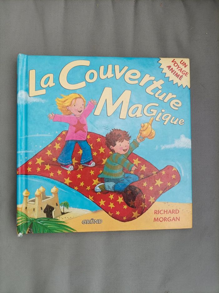 Joli livre pop up " la couverture magique"