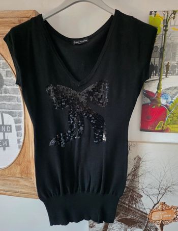 Pull avec un nœud en sequins