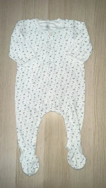 Vend body pyjama avec motif fleuries marque petit bateau taille 12 mois en très bonne état