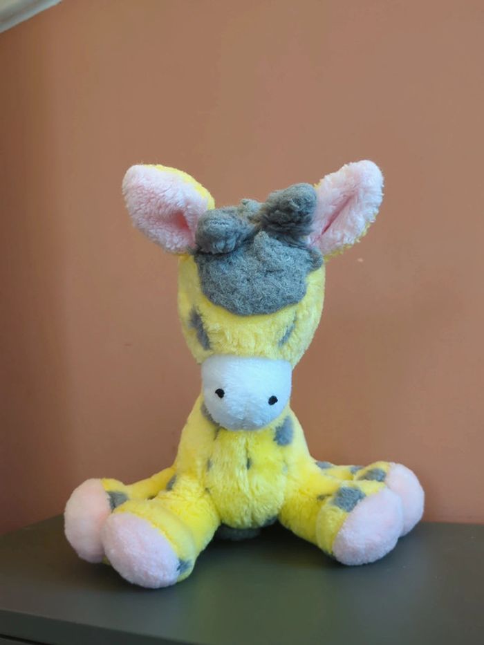 peluche girafe ajena