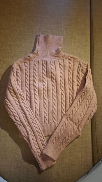 Pull col roulé rose