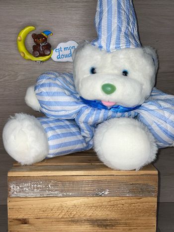PAM04 doudou ours 🐻 range pyjama Pampers