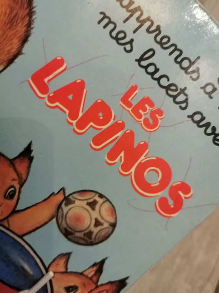 J'apprends à nouer mes lacets avec Les lapinos - photo numéro 3