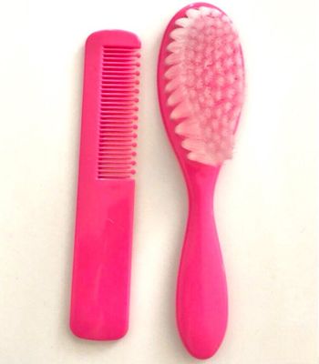 Brosse et peigne roses pour bébé