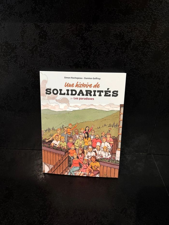 Livre une histoire de solidarité les paradoxes neuf