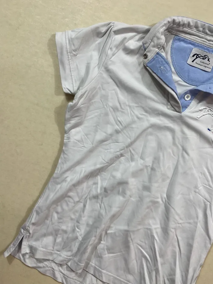 👕 Polo équitation Penelope Leprevost – Taille 14 ans – Blanc et bleu ciel – Très bon état - photo numéro 4