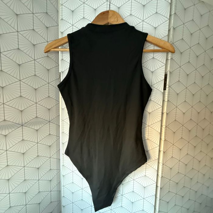 Body - photo numéro 2