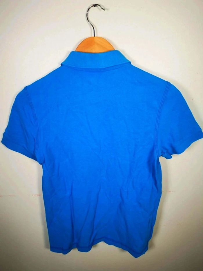 C29 polo bleu Lacoste T2 - photo numéro 2