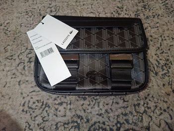 Saccoch Lacoste homme 