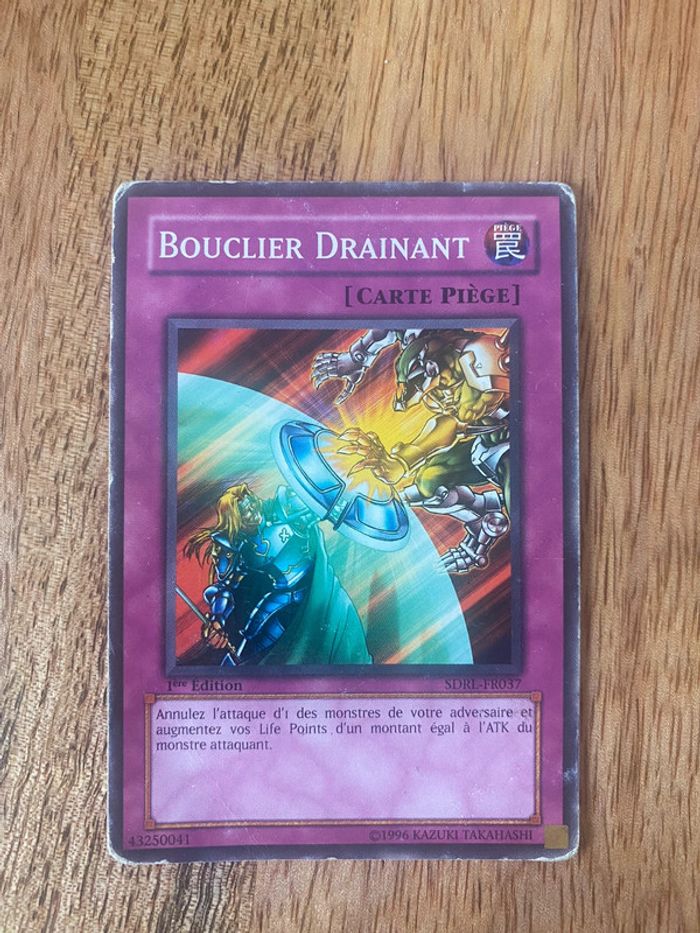 Carte Yu-Gi-Oh! Bouclier drainant SDRL-FR037 1ère édition