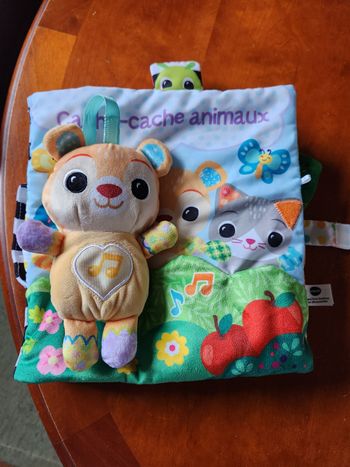 Livre tissu et son ourson musical et lumineux