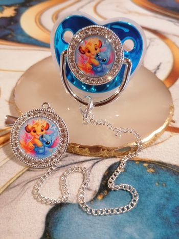 Tétine bleu Stitch et simba