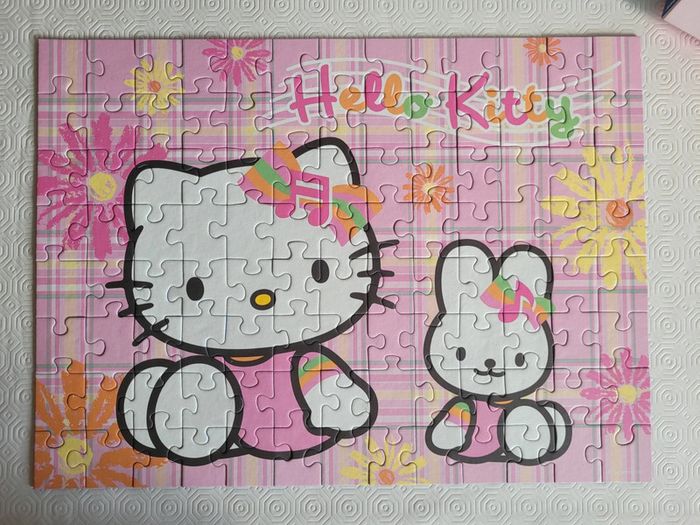 Puzzle hello kitty 100 pièces Ravensburger - photo numéro 2