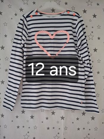 Tee-shirt rayé blanc et bleu marine avec un cœur rose 12 ans Okaïdi 
Très bon état ni trous ni tache