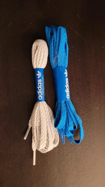 Lot de deux paires de lacets "No Sleep Rave Club"