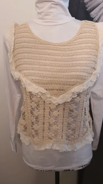 Petit pull sans manche