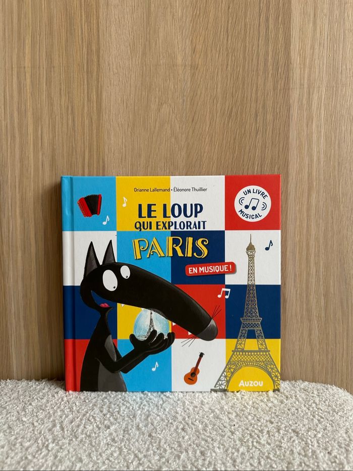 Livre le loup qui explorait Paris en musique