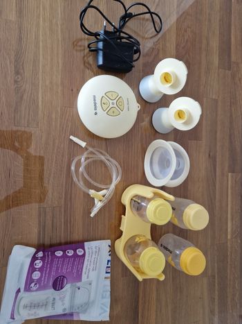 Tire lait medela swing flex double