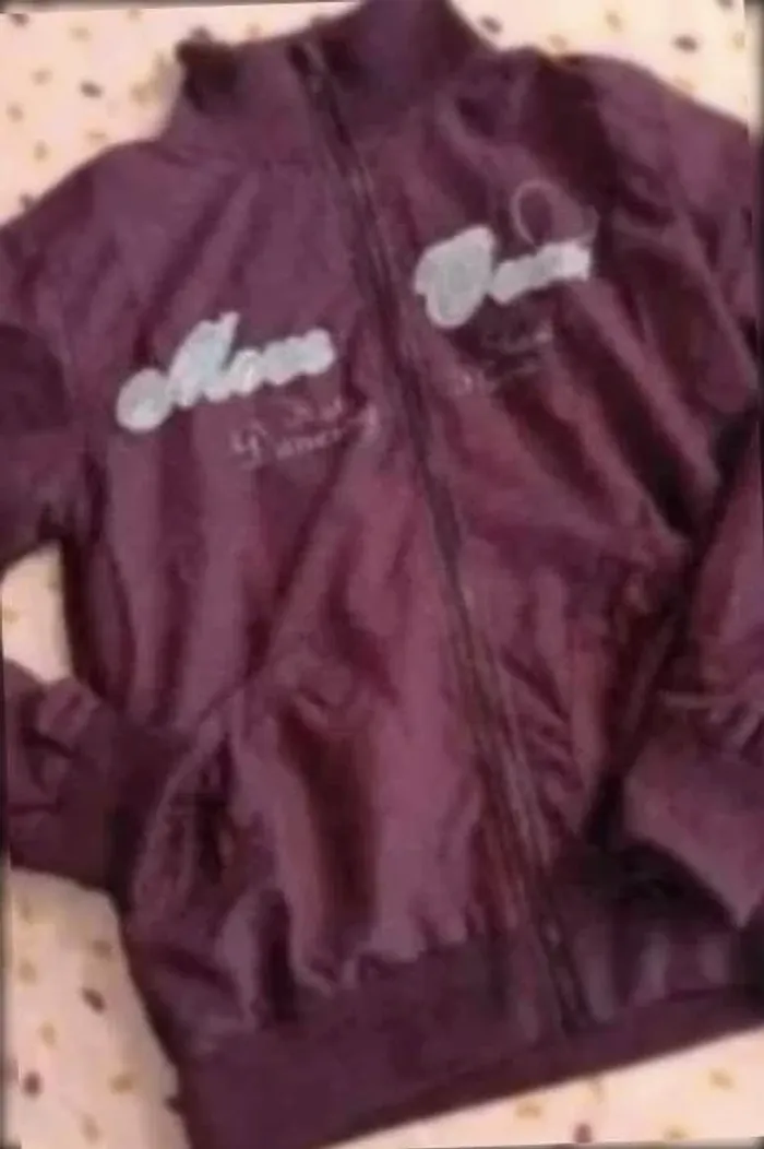 Veste Tissaia  12 ans très bon  état