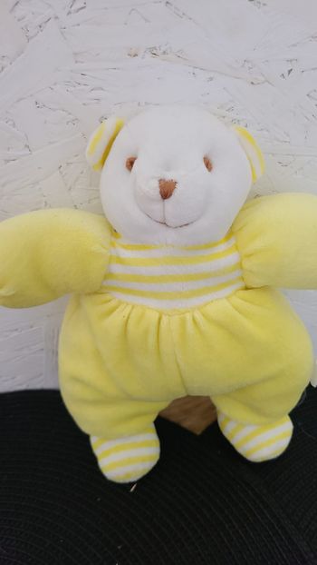 doudou ours blanc jaune