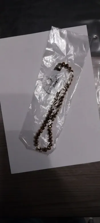 Collier fantaisie perles irisées. Marron