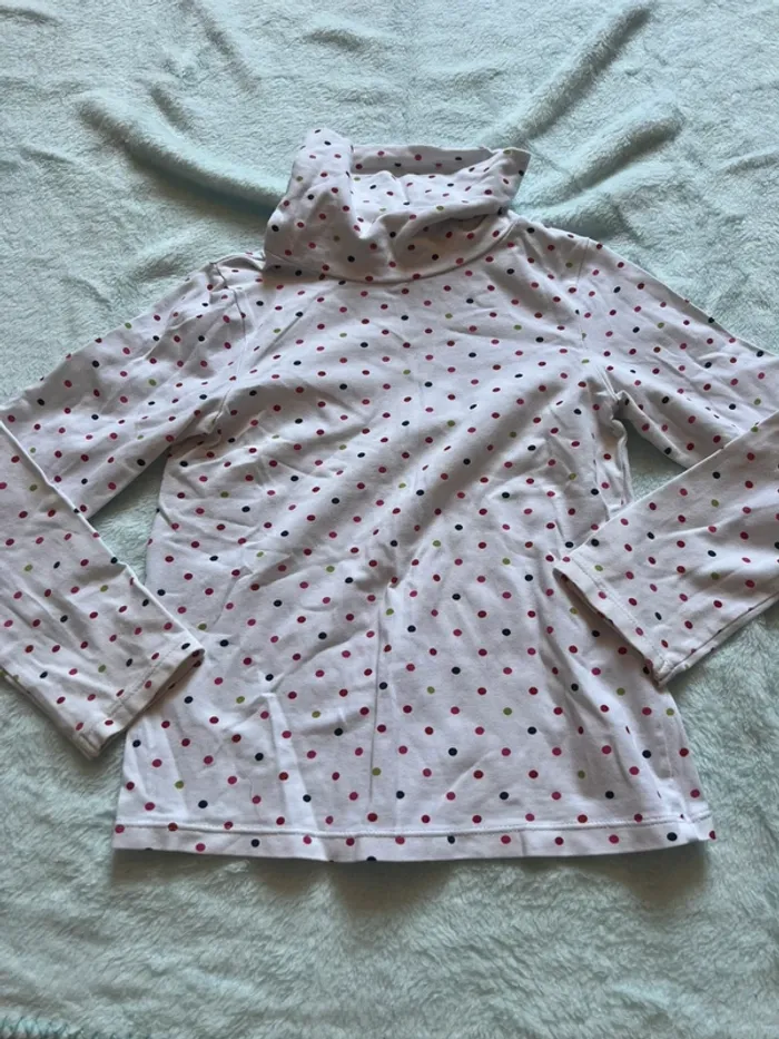 Pull coll roulé a poids