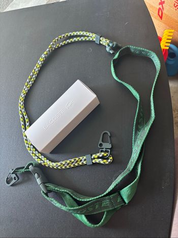 Lanière téléphone Lacoste