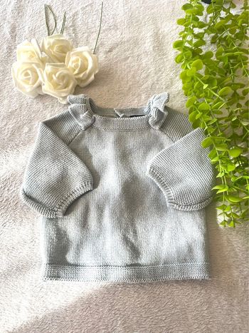 Très beau pull à. Longue manche bébé fille