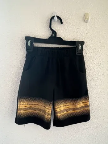 Short noire doré taille 4 ans 💫