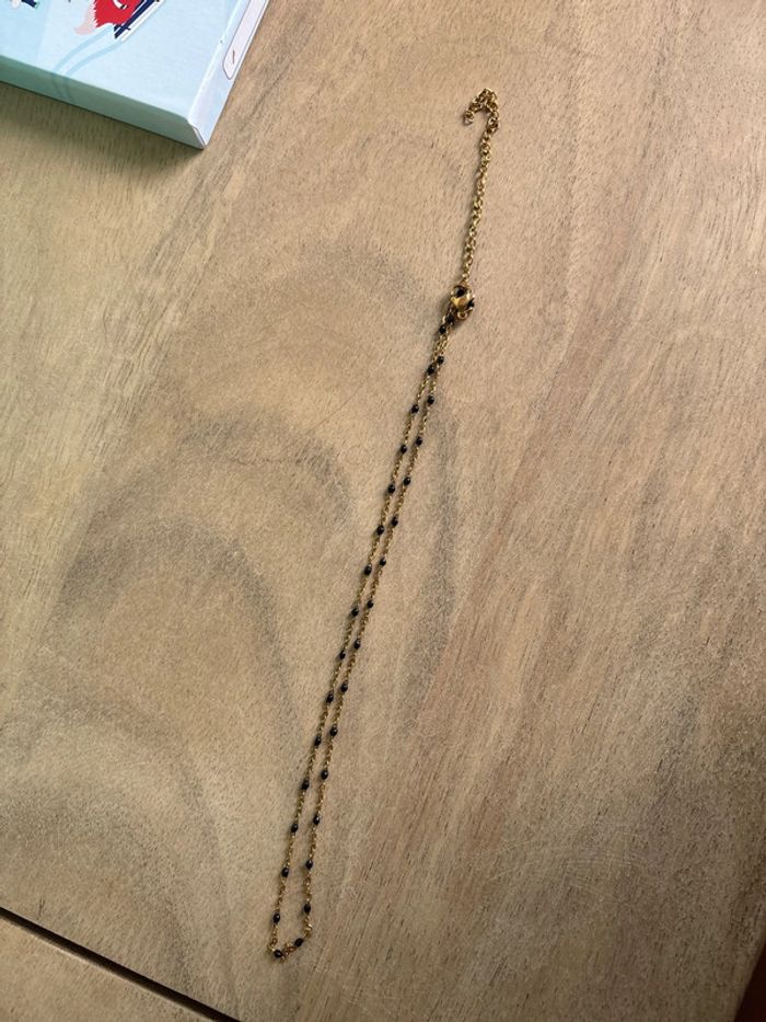 Collier doré et noir - photo numéro 3