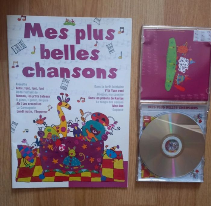 CD et sont livre de chansons - photo numéro 3