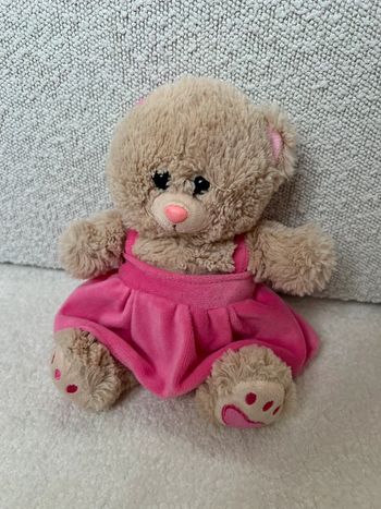 Peluche ours avec robe rose