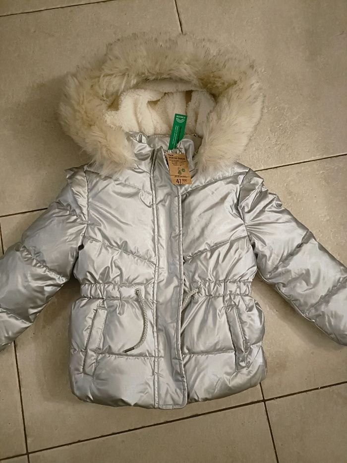 Doudoune hiver tao argentée neuve 6 ans