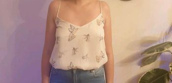 Top avec des petits oiseaux