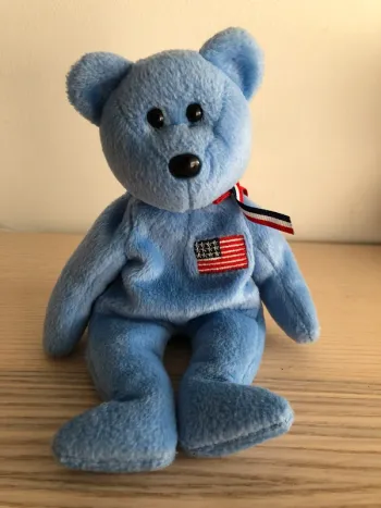 Peluche ours bleu