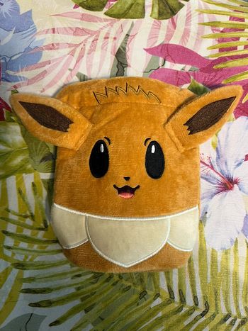Pochette peluche evoli prismatique Pokémon