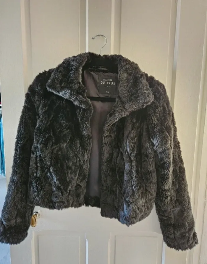 Manteau fausse fourrure T.S