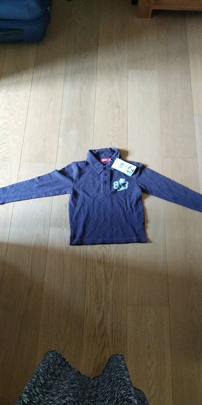 Polo manches longues NEUF
