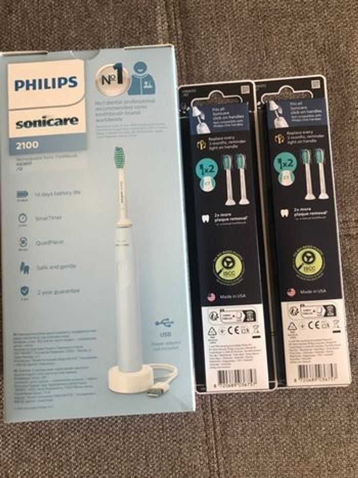 Neuf lot 1 brosse à dents électrique Philips sonicare et 4 brosses neuves de rechanges - photo numéro 2
