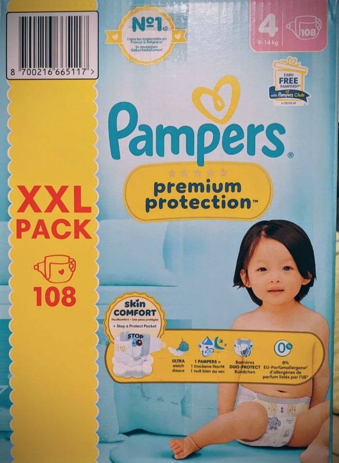 Couches Pampers prenuim XXL T4(9-14kg)