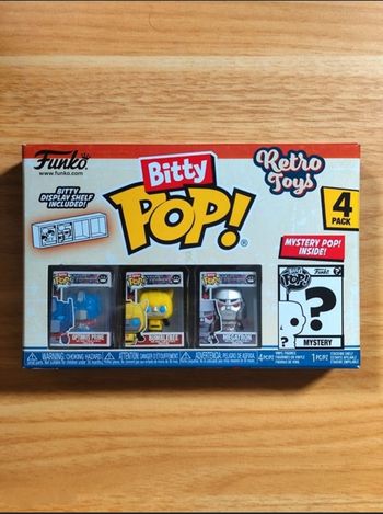 Boîte 4 Bitty Pop - Optimus Prime, Bumblebee, Megatron + Mystère - Transformers (Retro Toys)