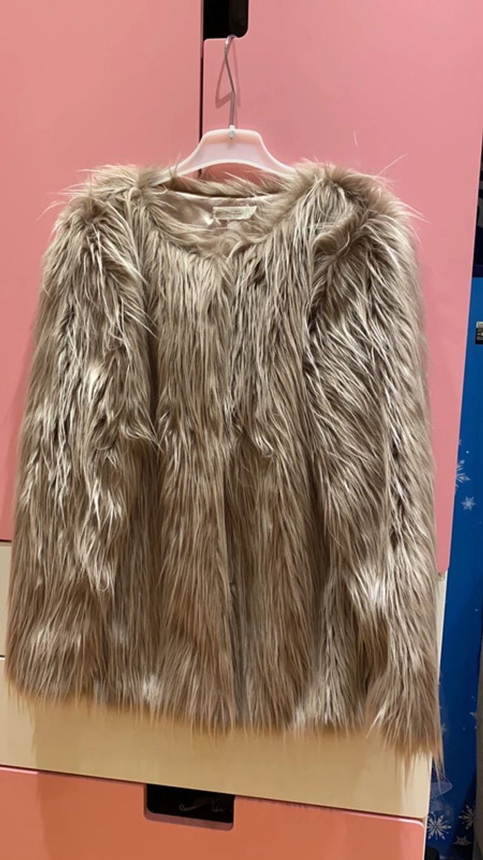 Manteau en fausse fourrure10 ans