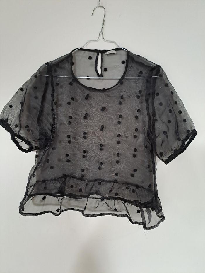 Blouse transparente noire à pois