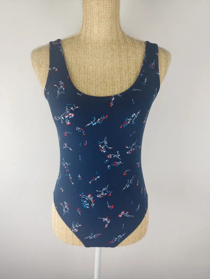 Body stretch bleu marine motif fleuri taille M Ardene neuf